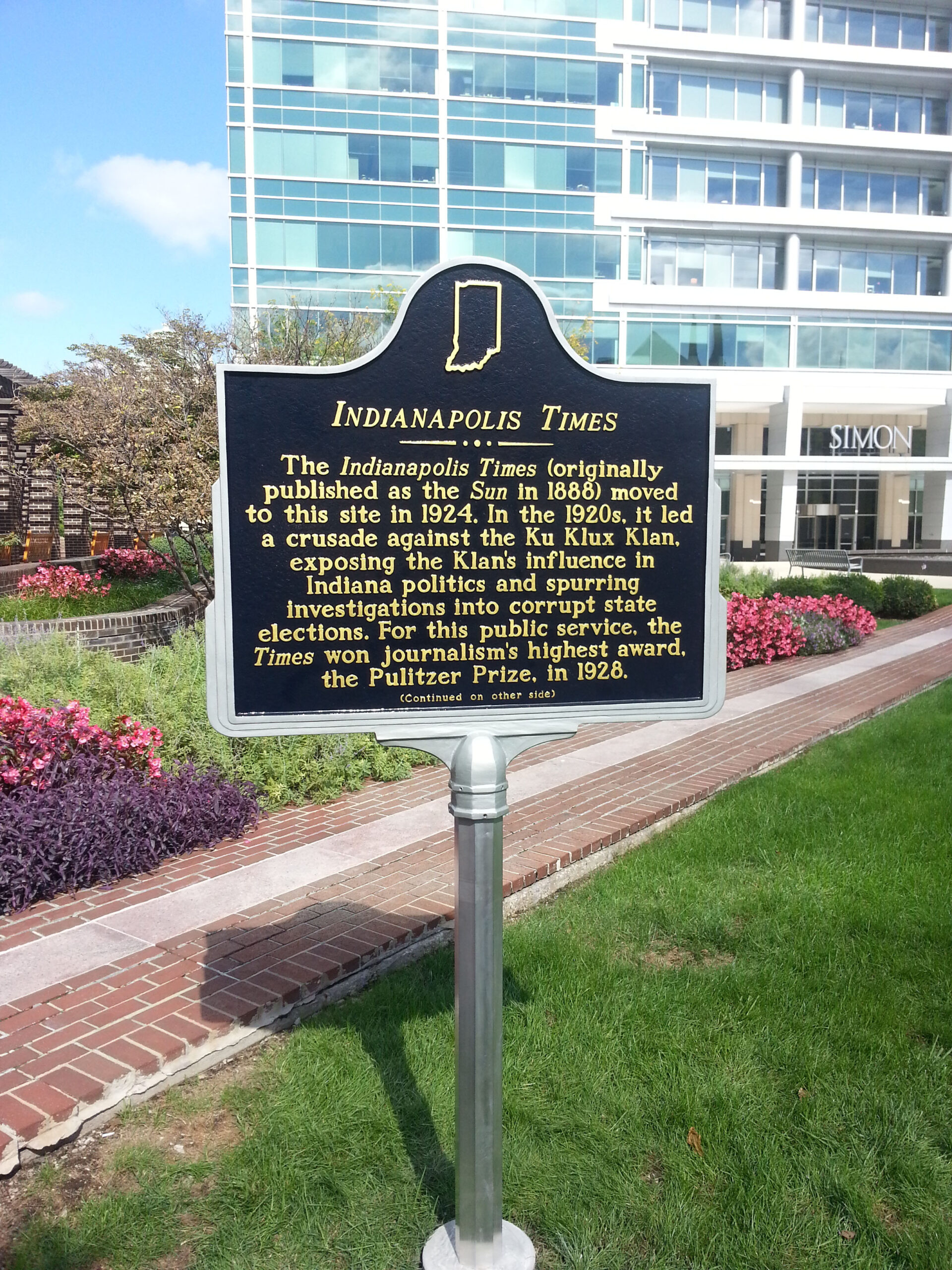A historical marker in downtown Indianapolis commemorates the Indianapolis Times, a newspaper that won a Pulitzer Prize in 1928 for its work to expose the Ku Klux Klan in Indiana. PHOTO SUBMITTED BY INDIANA HISTORICAL MARKER PROGRAM